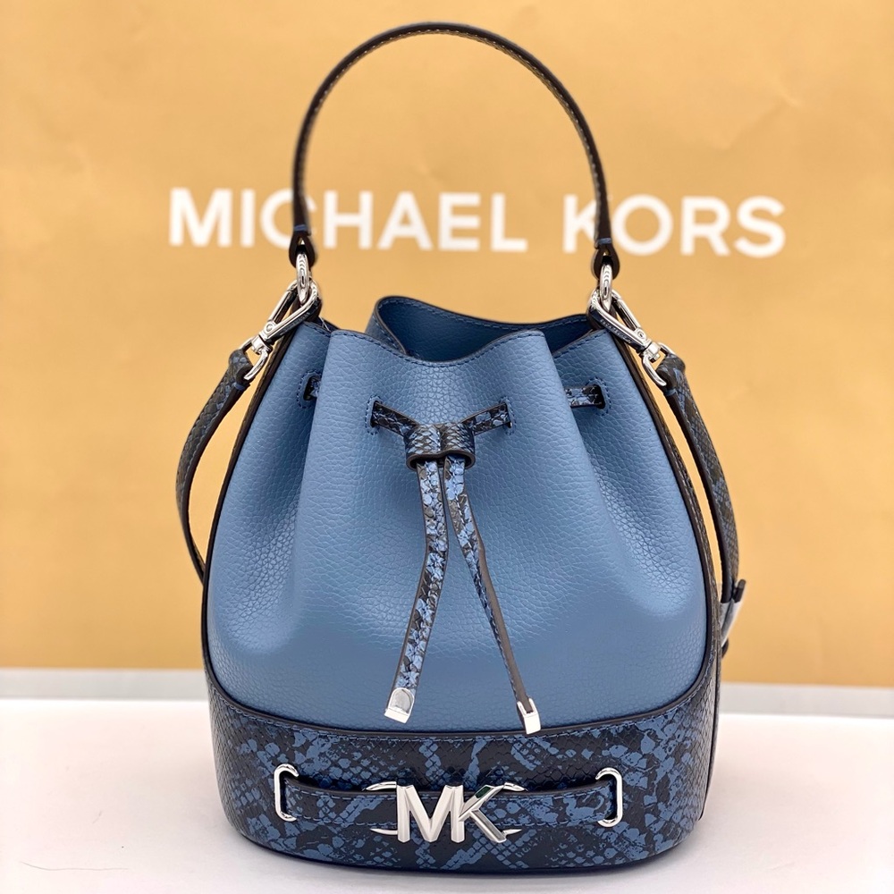 MICHAEL KORS REED MEDIUM BELTED
SATCHEL CROSSBODY